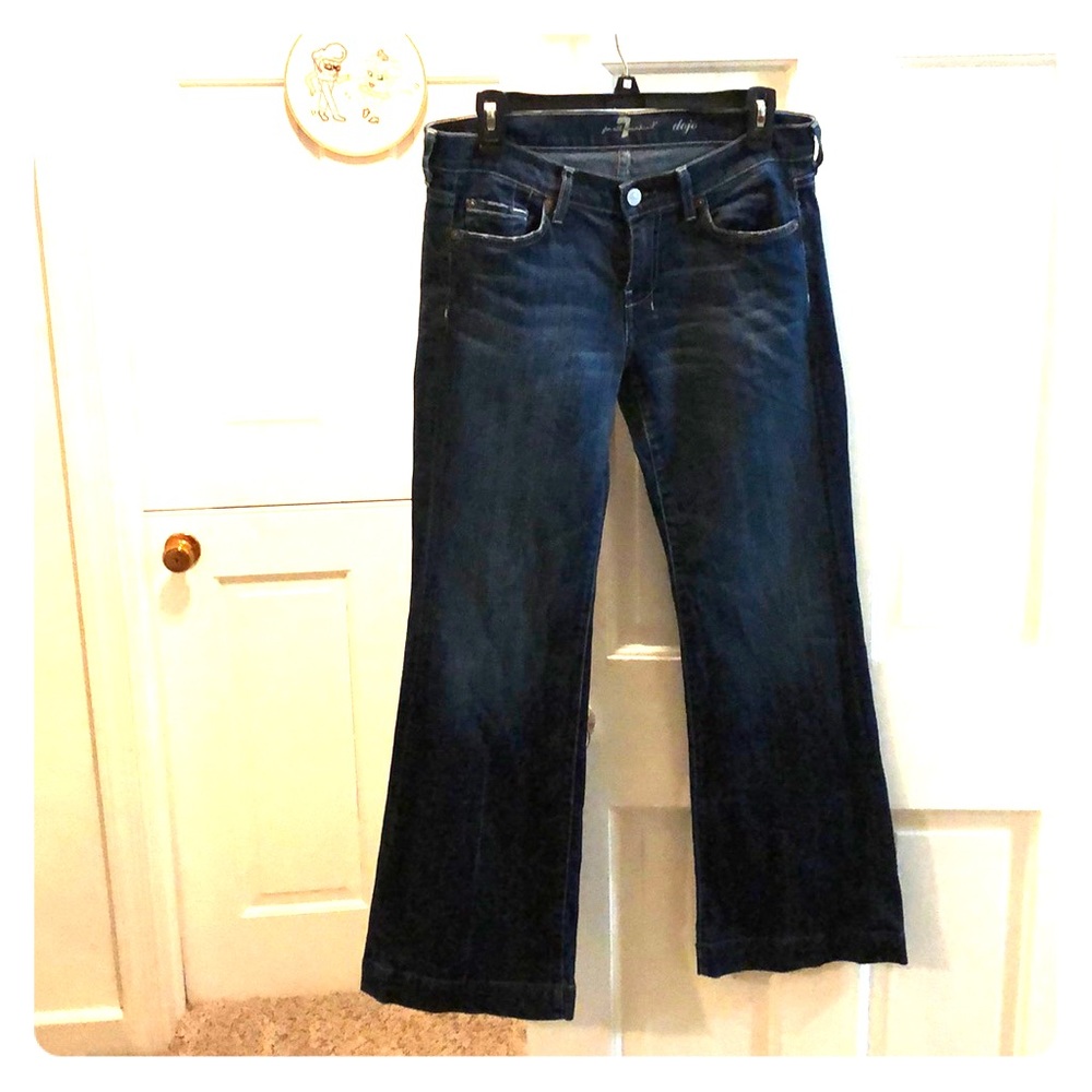 Dark wash wide leg bootcut jeans.